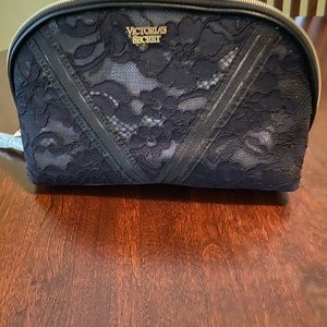 NEW Floral Lace glam Bag: 8 2/3”L x 3”Wx43/4” H